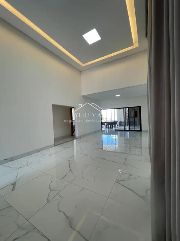 Fachada do Casa em condomínio no Jardim Veneza, Senador Canedo | 216m² | 3 Suítes | Pé-direito duplo